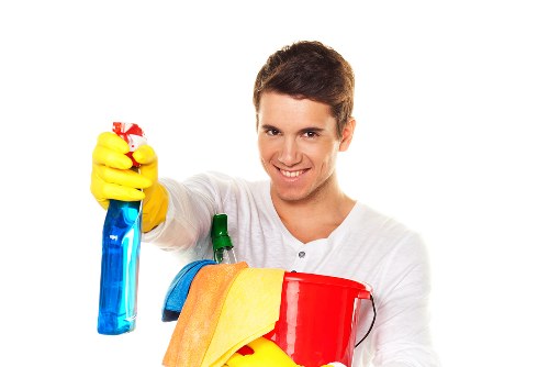 Cleaning supplies and organised office cleaning setup for a W6 business
